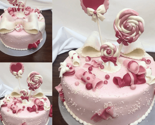 Ružová detská torta so sladkosťami a perlami