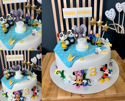 Biela torta s postavičkami Walt disney na party